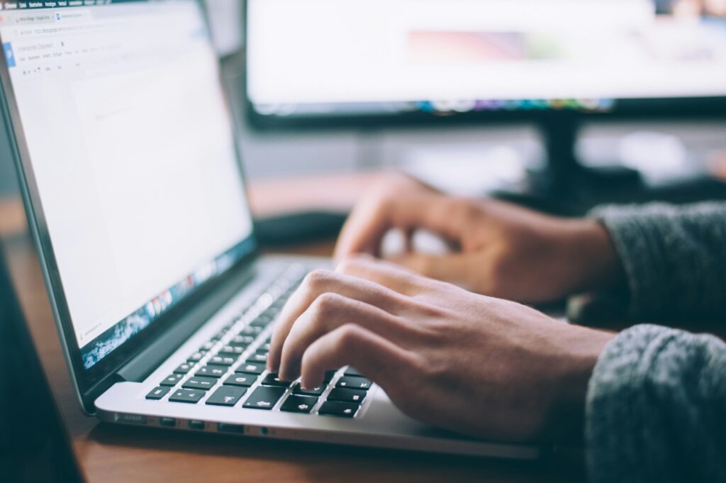 Picture of a man working on a laptop